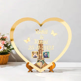 Custom Heart Shape Golden Acrylic Frame with engraved names and date, perfect for wedding or anniversary gifts, includes three photo inserts and wooden stand.